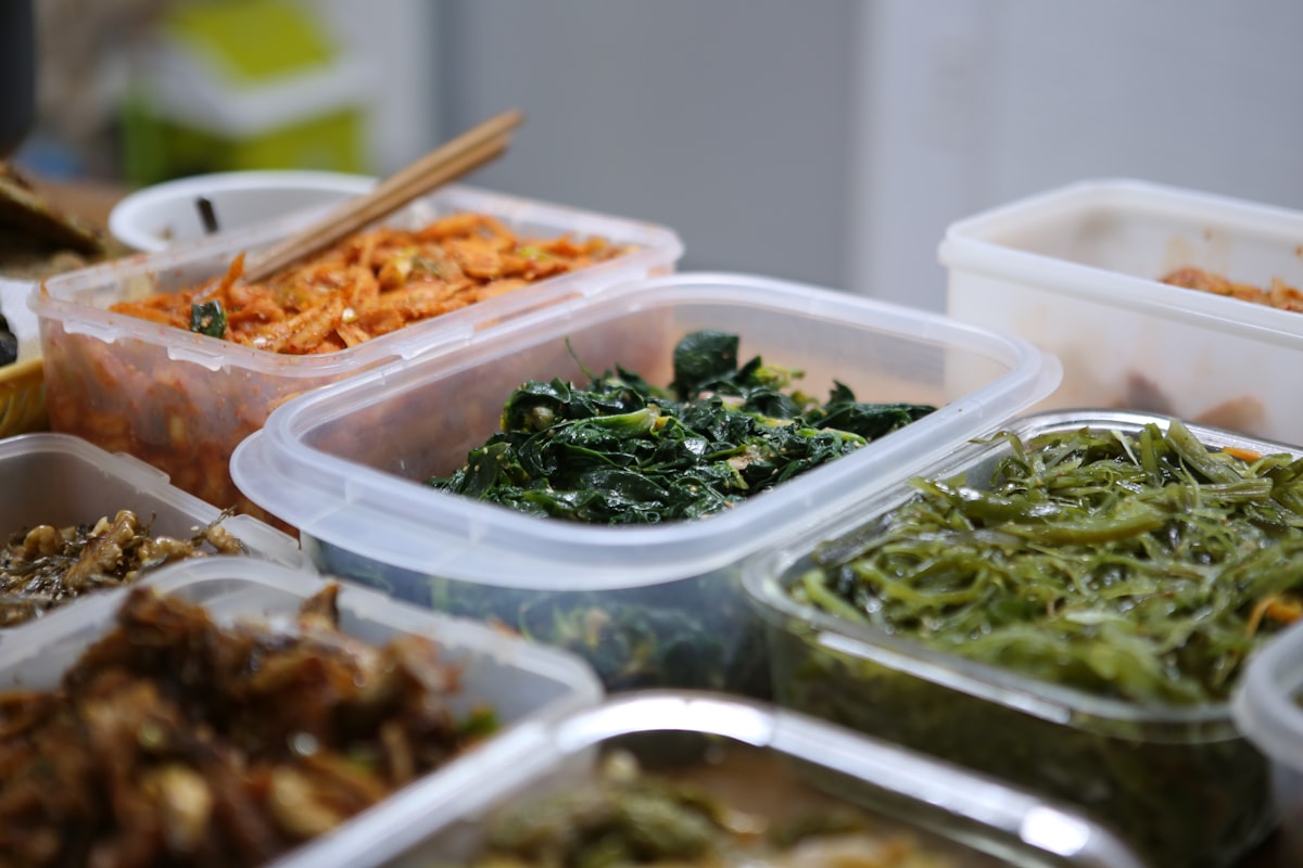 Glass meal prep containers stacked for storage